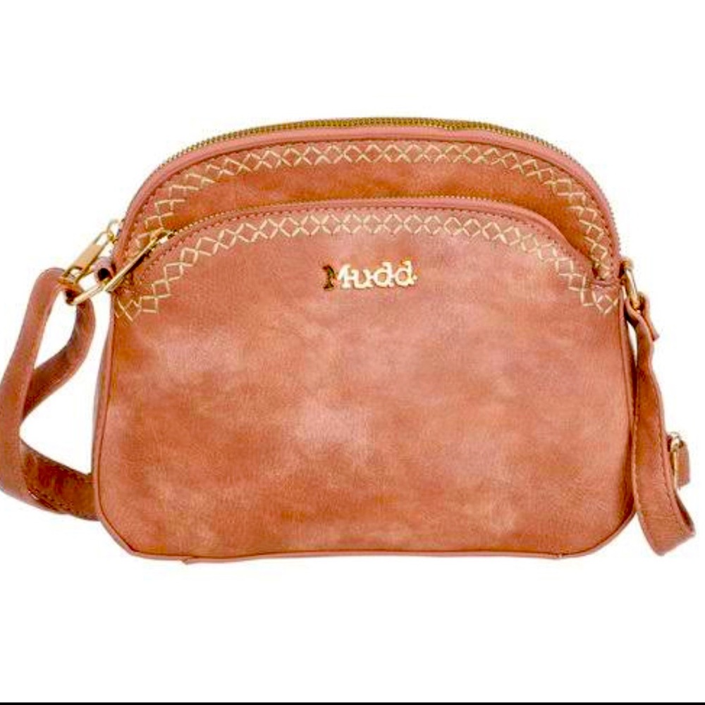 I’m selling a mudd purse color brown small bag slightly used